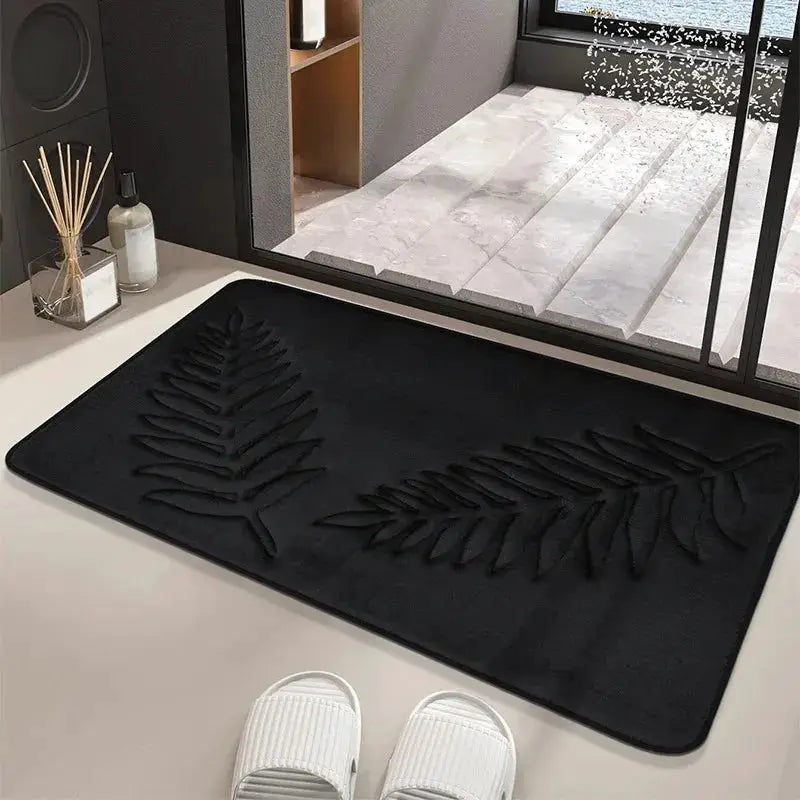 Simples Market 3-Piece memory foam bath mat set in black with embossed leaf design