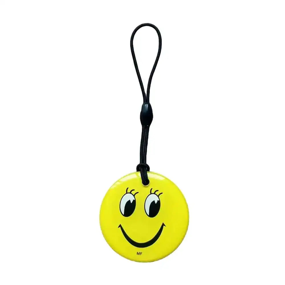 RFID key tag: yellow smiley-face circular key fob with black lanyard