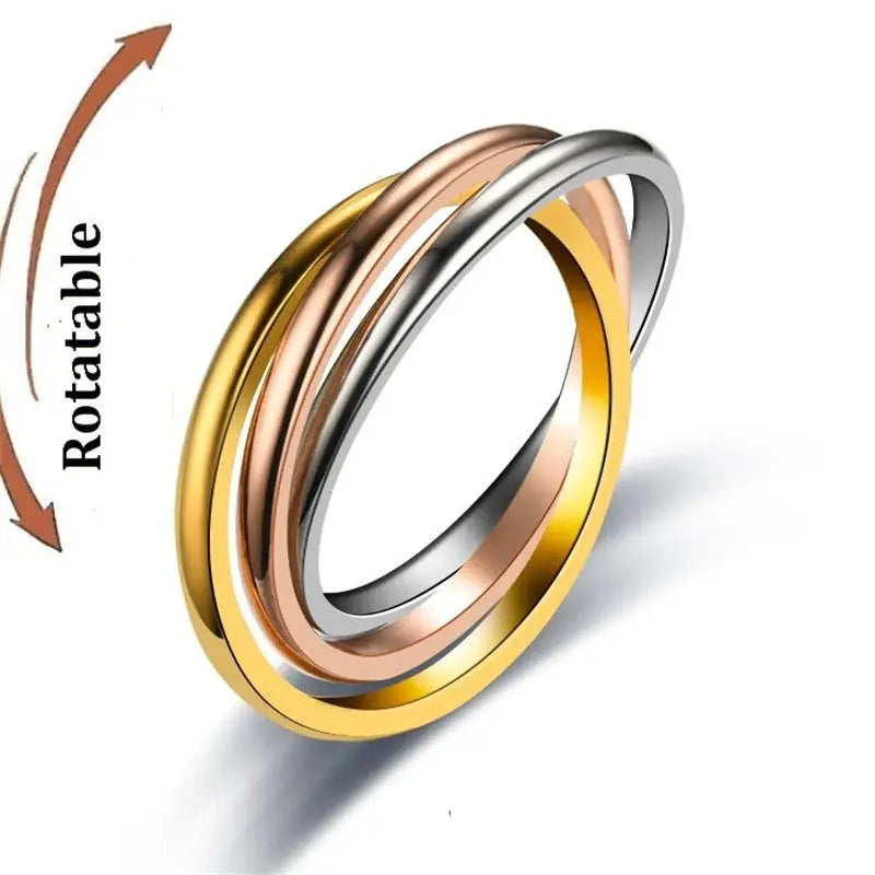 Anti-stress fidget spinner ring set, steel by Simples Market; rotating gold, rose gold, and silver knuckle rings.