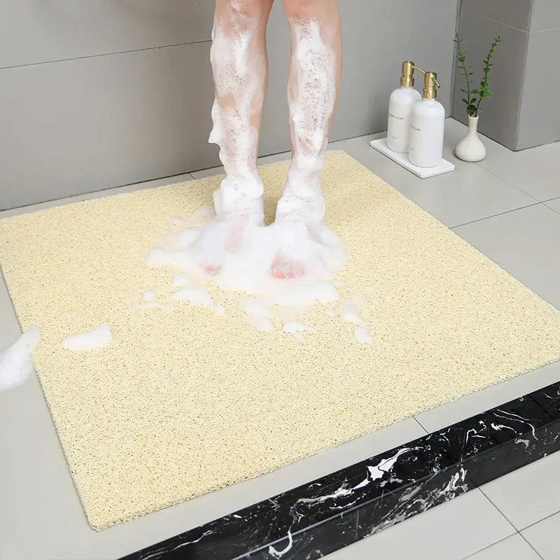 Non-slip hollow bath mat; beige foot-massage shower mat for bathroom, quick-drying tub floor.