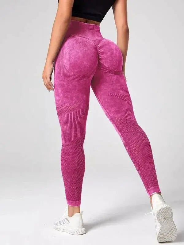 Ladies' pink high-waist yoga leggings with textured panels and butt-lift seams