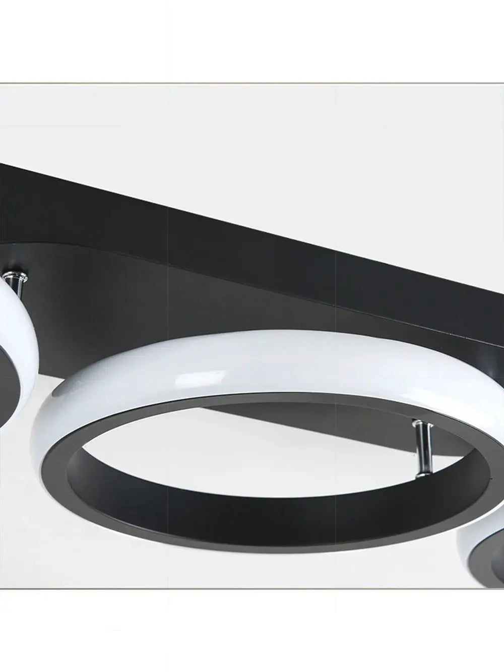 LED ceiling light with two white circular rings and black inner accents, modern fixture by Simples Market