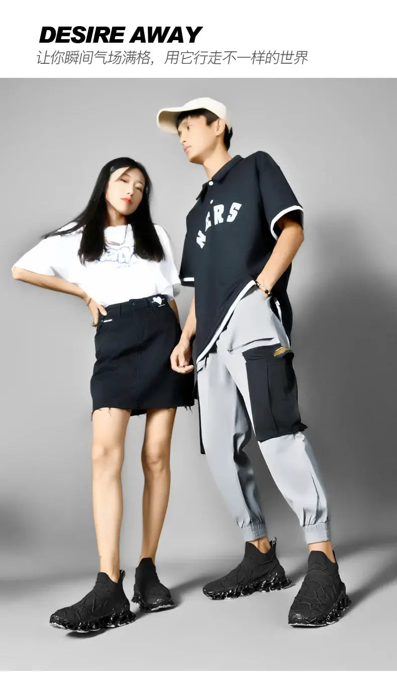 Men's black sneakers; casual athletic shoes with chunky soles, shown on two models.