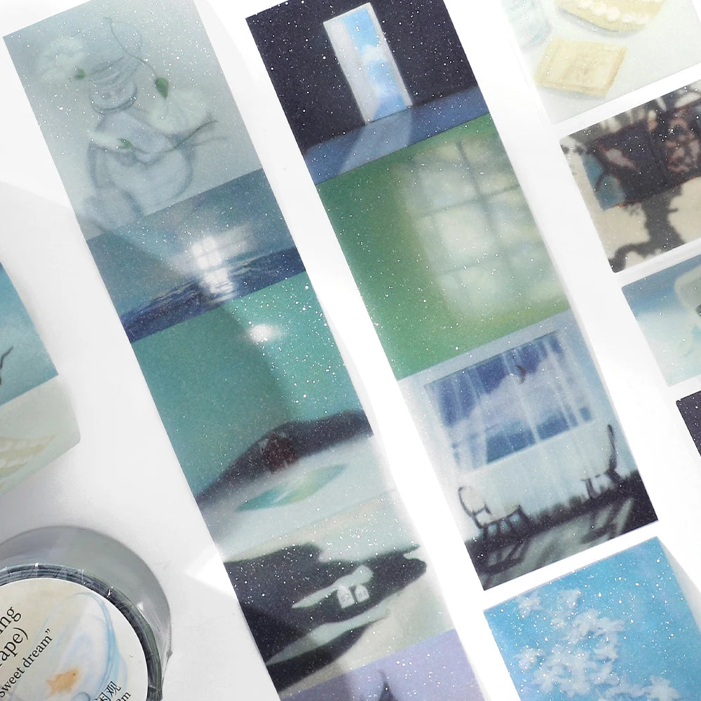 Decorative PET tape strips with scenic imagery for journaling and scrapbooking; glittery speckle pattern.