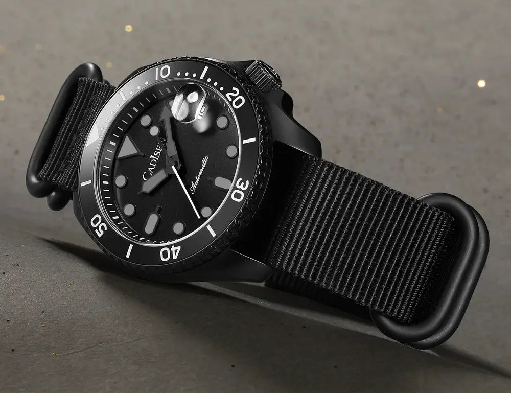 CADISEN men's black diver watch with ceramic bezel, sapphire glass, luminous markers, nylon strap.