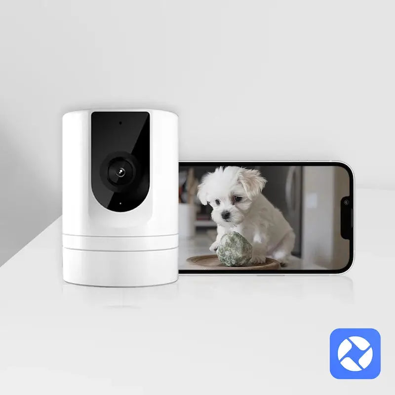 Pet camera, white indoor security camera with phone app, shown beside a smartphone displaying a puppy.