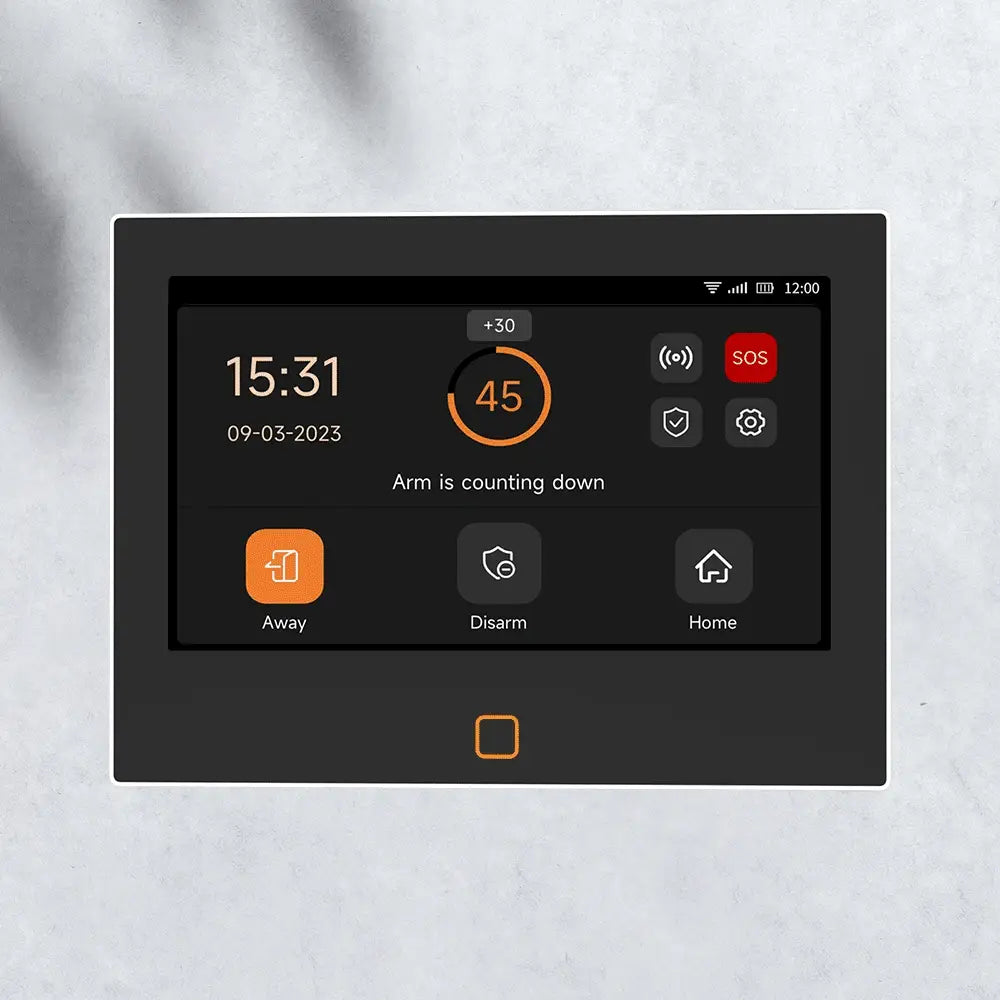Staniot 7-inch wireless home alarm panel with orange-accent touchscreen showing Away/Disarm/Home and countdown.