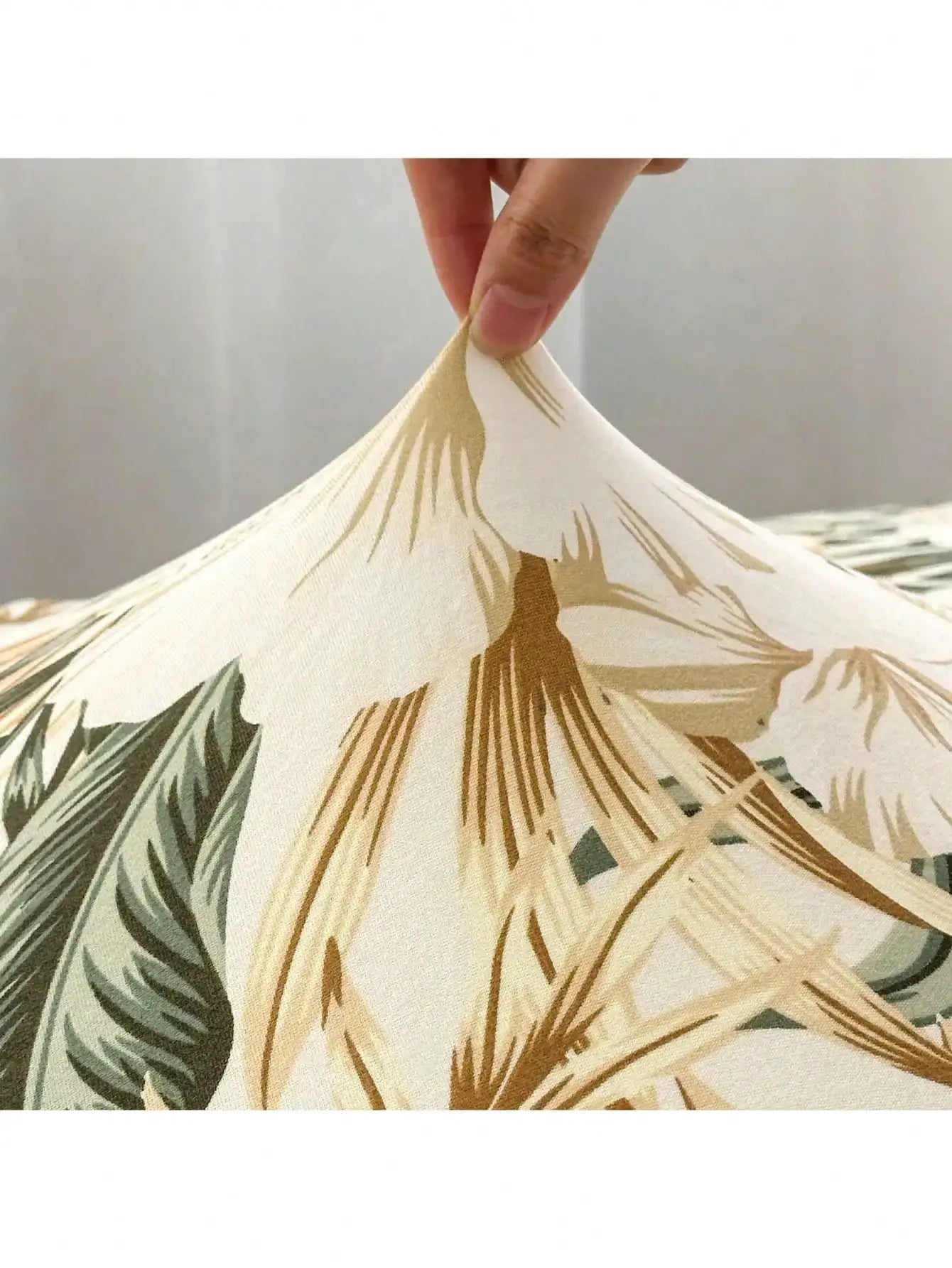 Simples Market outdoor tropical palm leaf sofa cushion cover; cream background with green and tan leaves