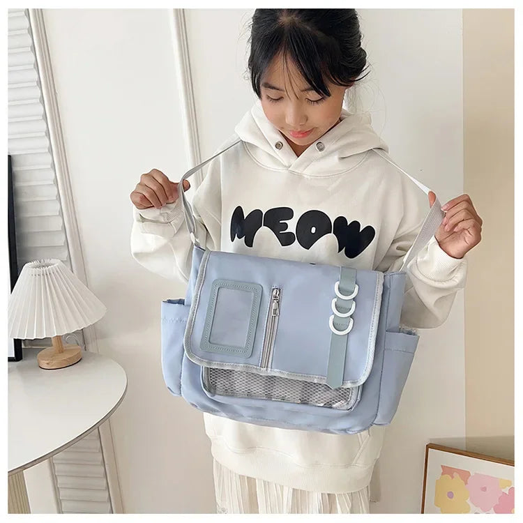Itabag shoulder bag in light blue with clear display panel and mesh pocket