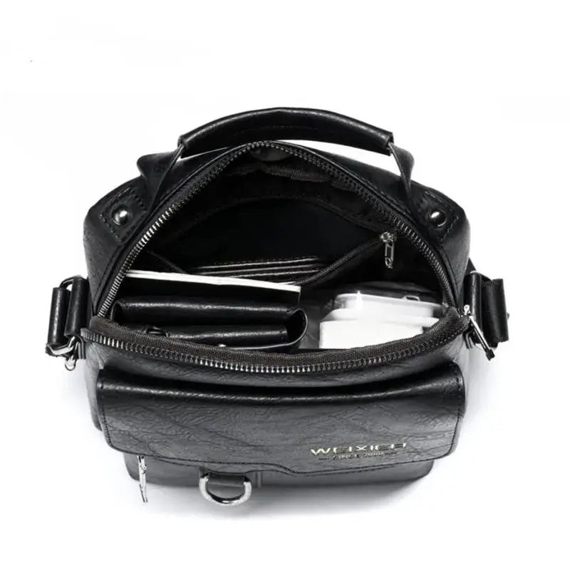 Men's black leather crossbody shoulder bag with multiple zip compartments, Simples Market.