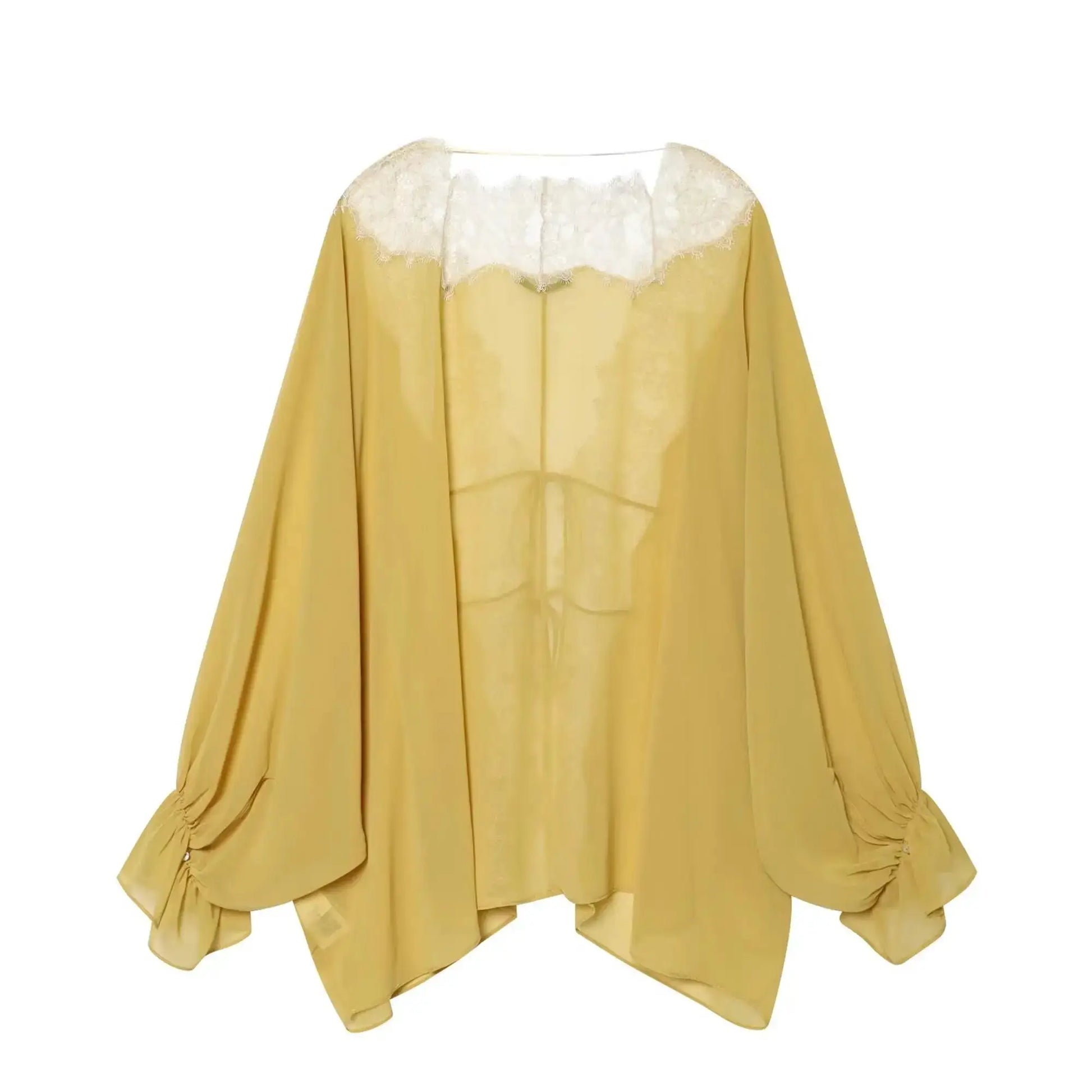 Mustard yellow sheer blouse with white lace yoke and lantern sleeves.
