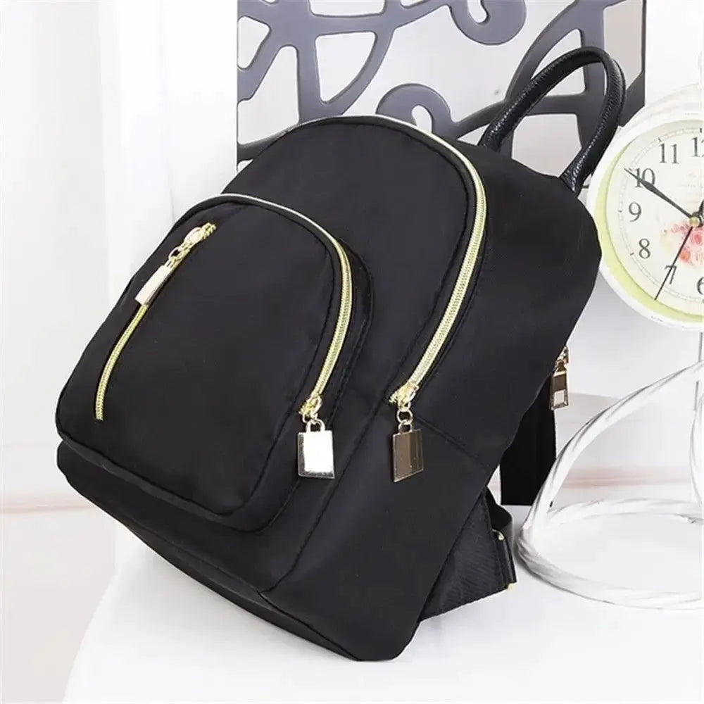 UrbanCarry Oxford Daypack Mini Backpack Durable Oxford Fabric With Adjustable Strap And Multiple Compartments