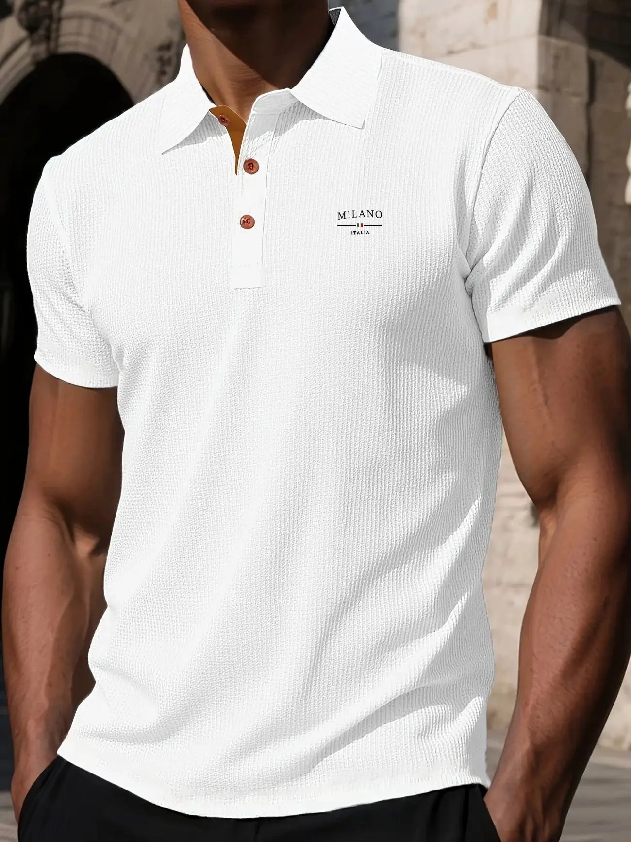 Men's white textured short-sleeve polo shirt with Milano Italia logo and brown buttons.