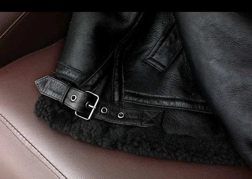 Black leather fur jacket with belt buckle and shearling trim