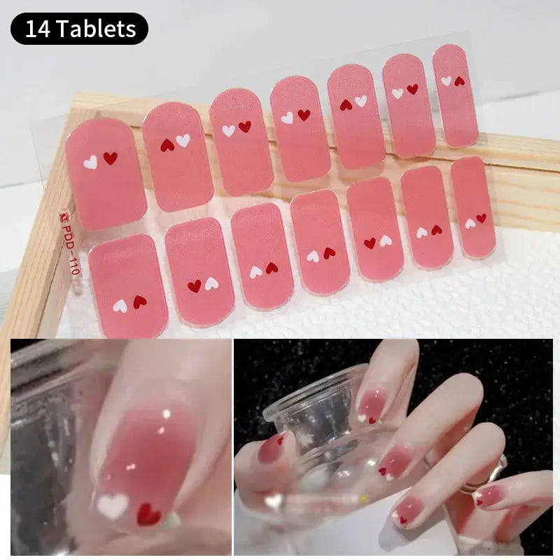 Full-cover pink nail stickers with red and white heart accents, Simples Market 14-piece self-adhesive manicure decals.