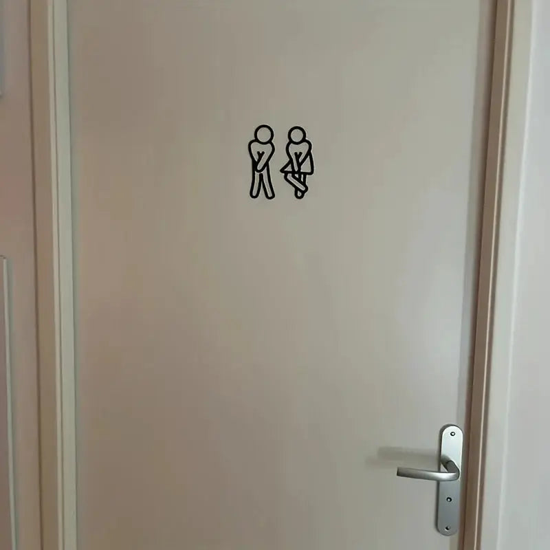 Restroom door sign with two black 2D icons (men and women) on a white door