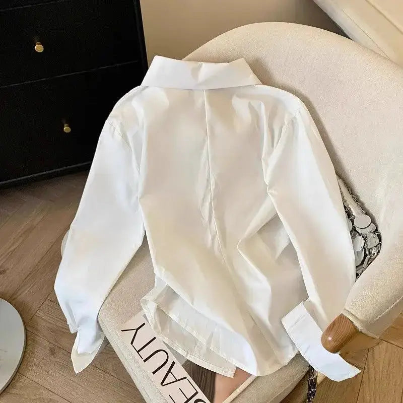 White women's long-sleeve polo shirt, designer tunic blouse with irregular hem