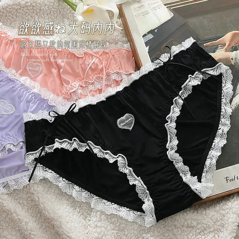 3-piece lace panties set in black, pink, and lavender with white lace trim and heart appliqué