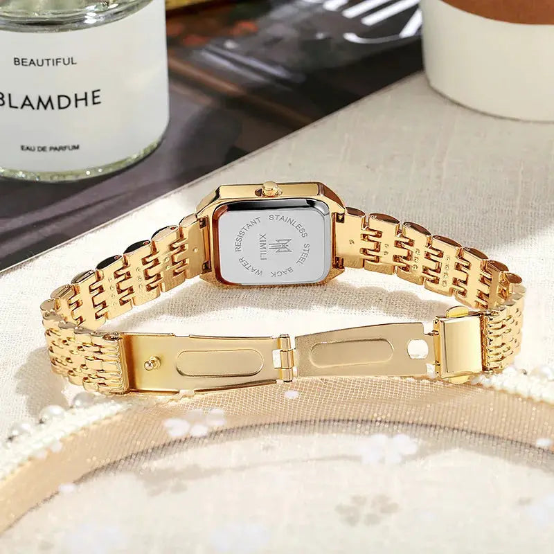 Gold-tone rectangular women's watch by Simples Market with stainless steel bracelet and quartz movement