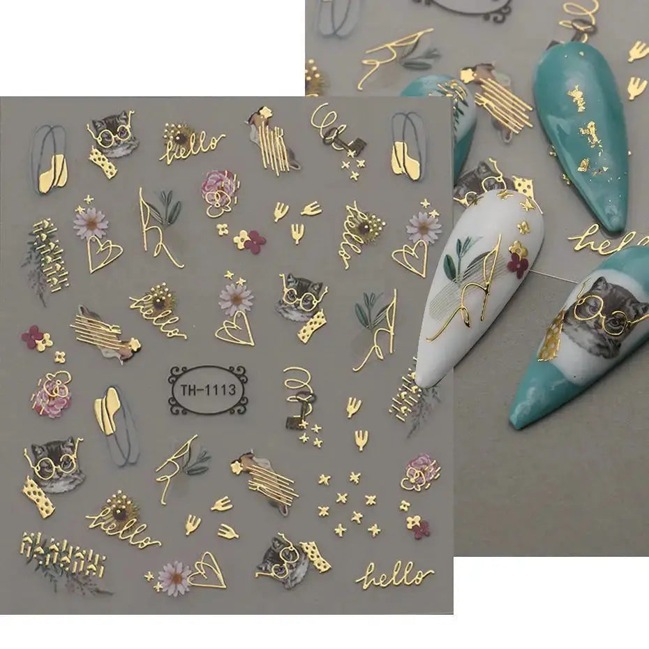 1 sheet of gold bronzing nail art decals featuring florals, hello script, hearts and geometric lines