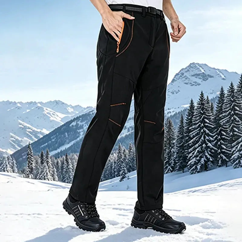 JNLN thick warm fleece hiking pants for men, black with orange zip, waterproof windproof soft-shell trekking trousers