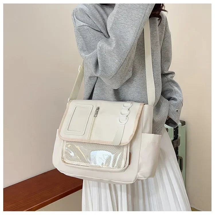 Itabag shoulder bag in cream with transparent front pocket and crossbody strap, Y2K Harajuku style