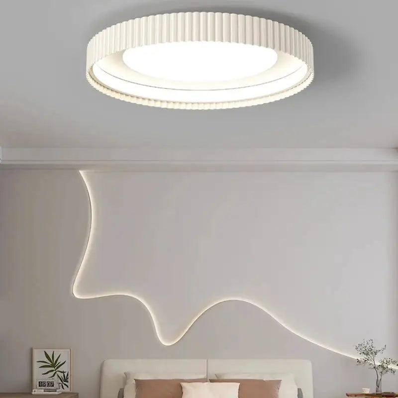 Modern round LED ceiling light by Simples Market; white ribbed metal ring for living, dining, or bedroom