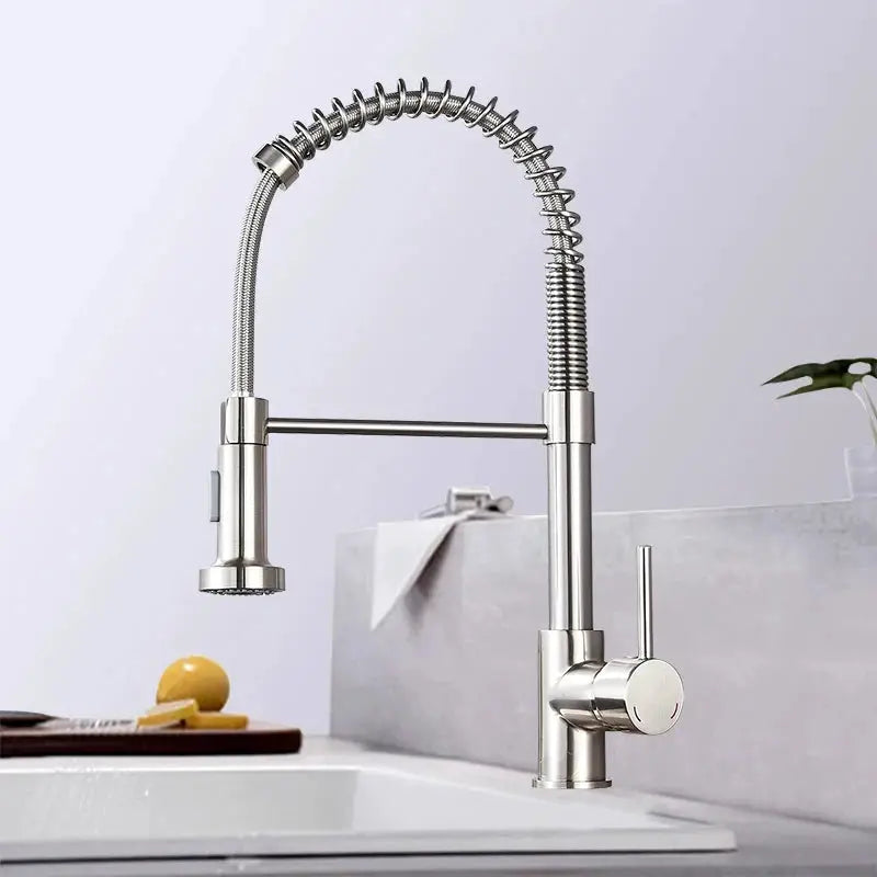 Spring-coil pull-down kitchen faucet with deck-mount mixer, brushed nickel finish, 360° swivel.