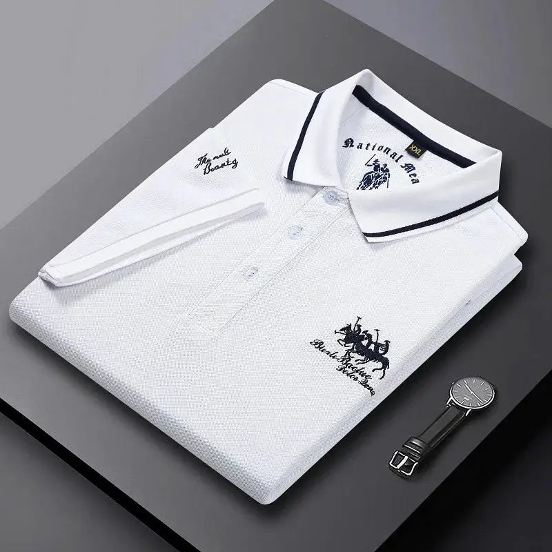White polo shirt with navy-trim collar and short sleeves, embroidered crest logo by Simples Market