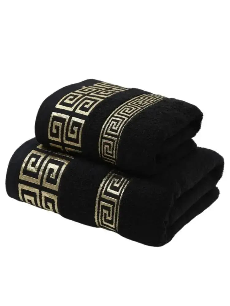 2-piece black cotton bathroom towel set with gold geometric embroidery borders