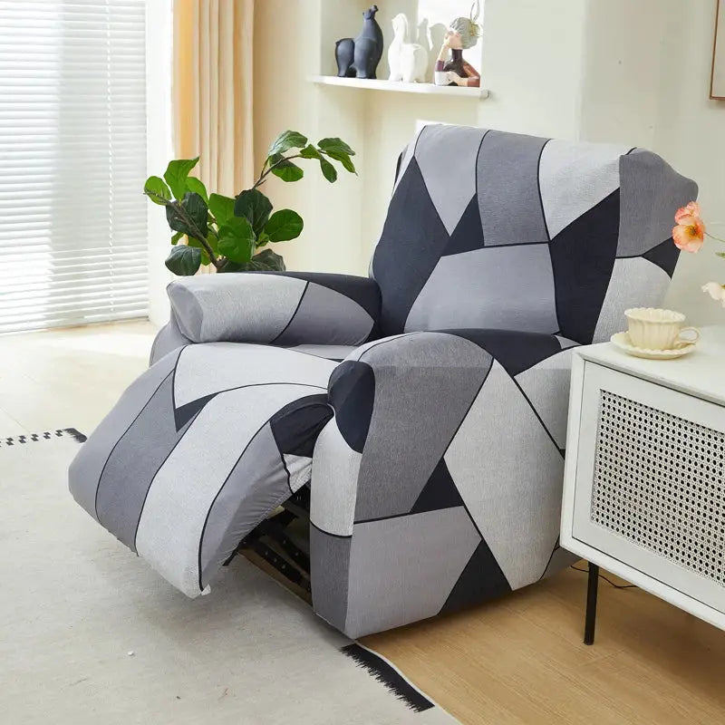 Stretch recliner chair cover in gray and navy geometric patchwork pattern