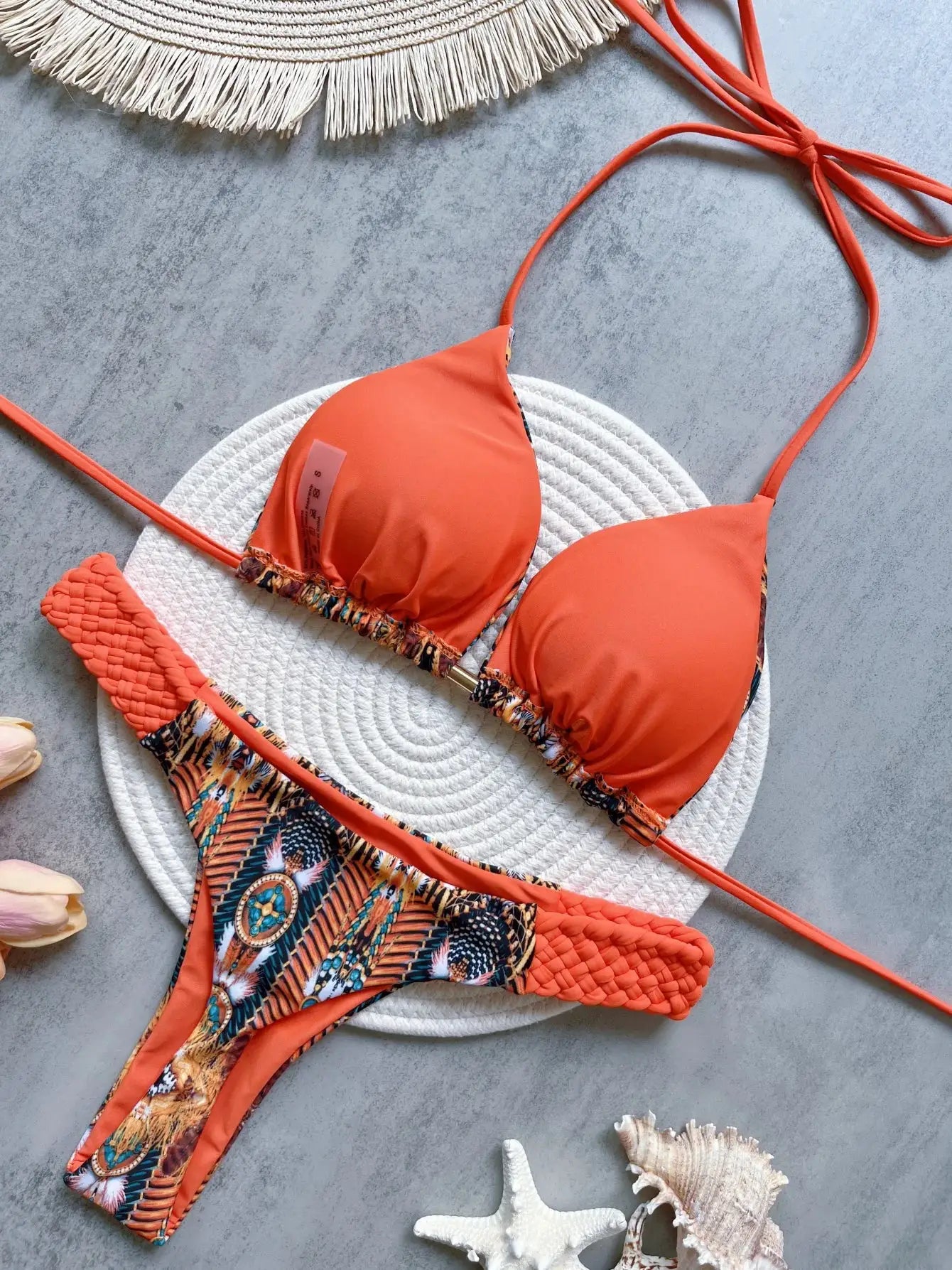 Simples Market RUOTONSEPT two-piece bikini set: orange halter top and tropical-print high-cut bottoms