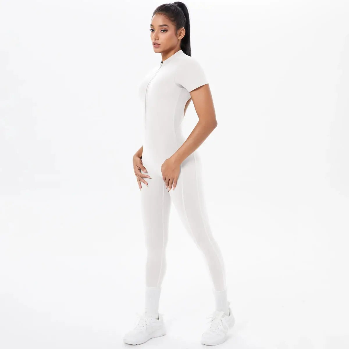 Women's white short-sleeve fitness jumpsuit with front half-zip, one-piece gym bodysuit