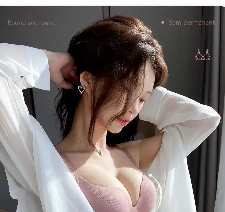 Push-up bra in pink with 6cm padding and no steel ring, worn under an open white shirt.