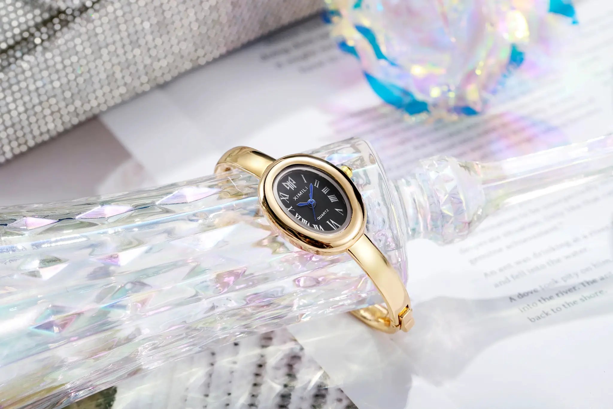 Gold-tone women's quartz wristwatch with black Roman numeral dial, Simples Market