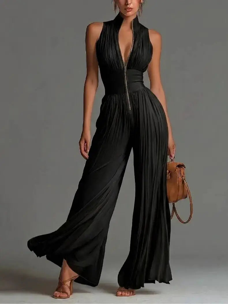 Jumpsuit by Simples Market, black sleeveless stand-collar front-zip pleated high-waist wide-leg romper.