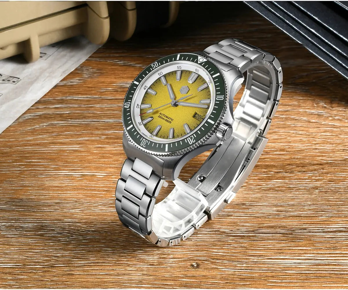 San Martin 40mm dive watch with yellow dial, green bezel, stainless bracelet, NH35 automatic, 200m