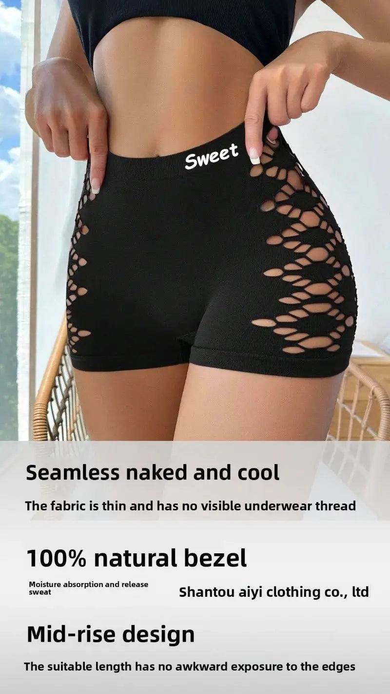 Seamless black sports underpants shorts with side hollow-out mesh panels; mid-rise waistband reads Sweet.