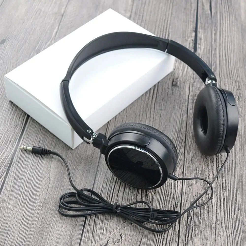 Universal 3.5mm wired over-ear headset, black foldable design with padded earcups