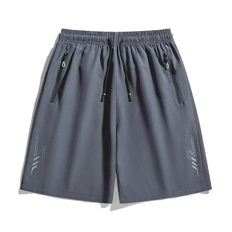 Men's quick-dry running shorts with drawstring and zip pockets, grey with neon zipper pulls
