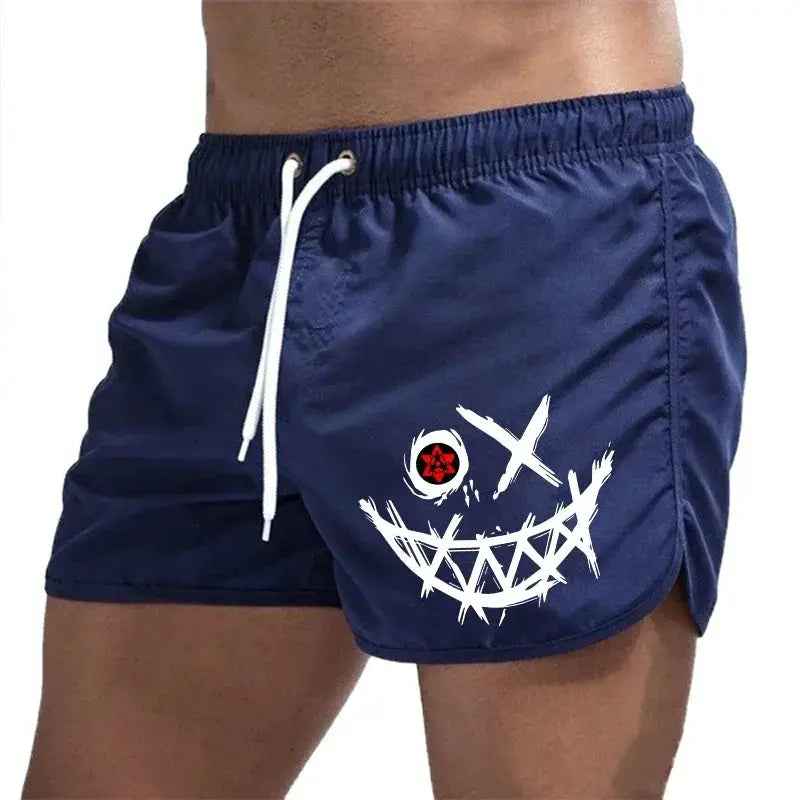 Men's navy board shorts with white drawstring and a large white stitched smile graphic on the front left leg