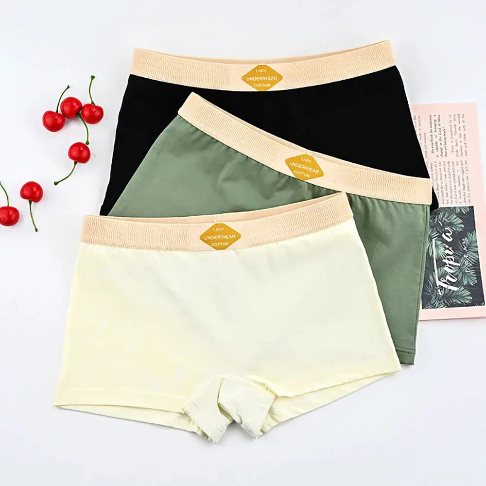Simples Market 3-pack cotton women's boyshorts in cream, olive green, and black with beige elastic waistband