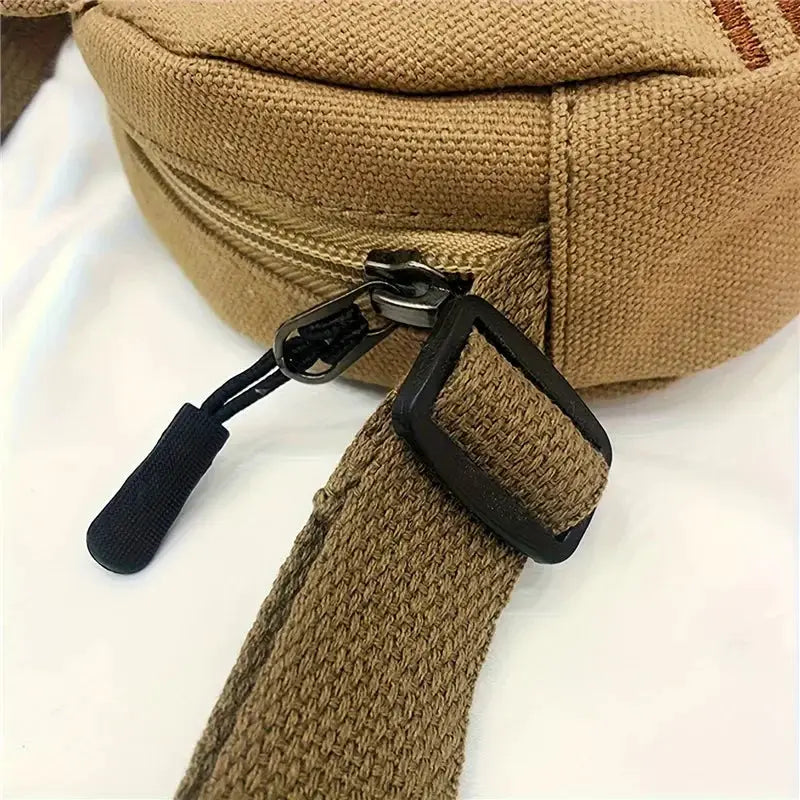 Fish Shape Canvas Messenger Bag in tan with adjustable strap and zipper closure