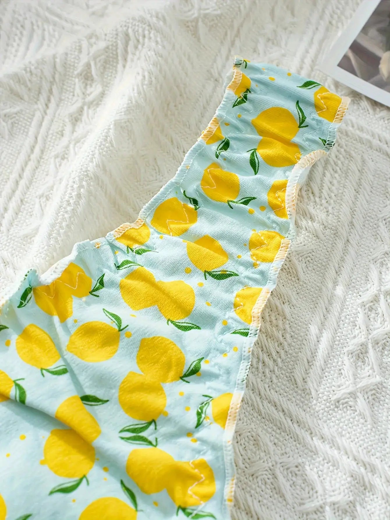 Pure cotton women's thong underwear with lemon print on light blue, ruffled edges