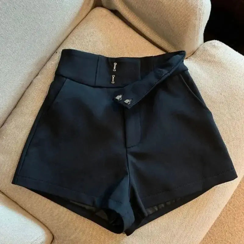 Women’s black high-waisted shorts with belt detail, A-line silhouette