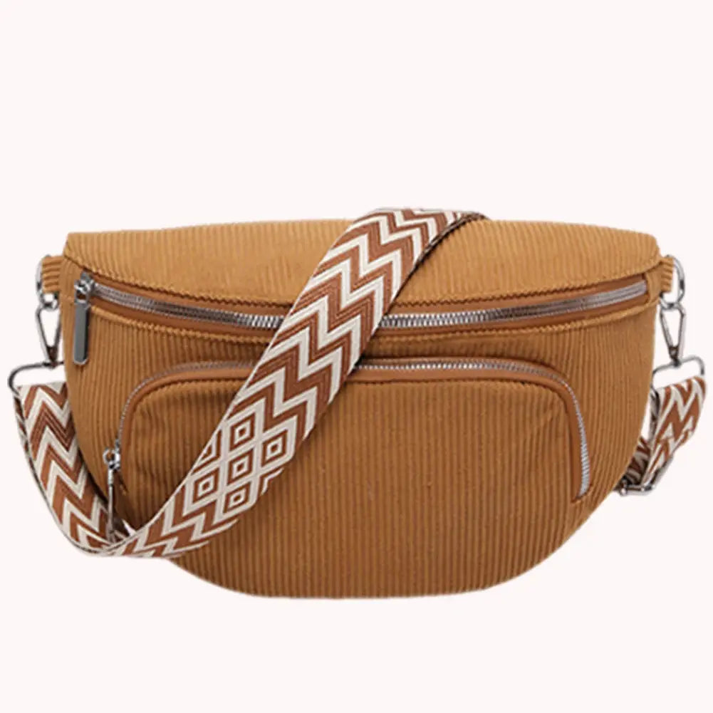 Brown corduroy waist bag with a wide chevron strap; multi-pocket fanny pack for travel