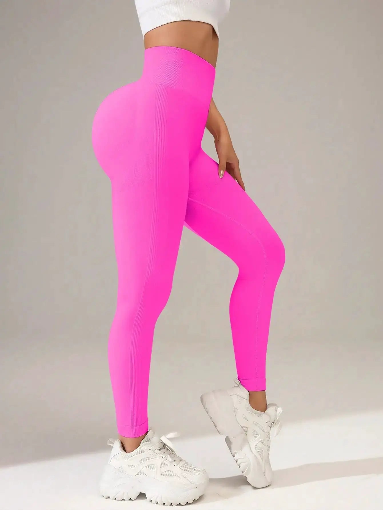 Simples Market women's seamless yoga leggings with high waistband in neon pink, butt-lifting