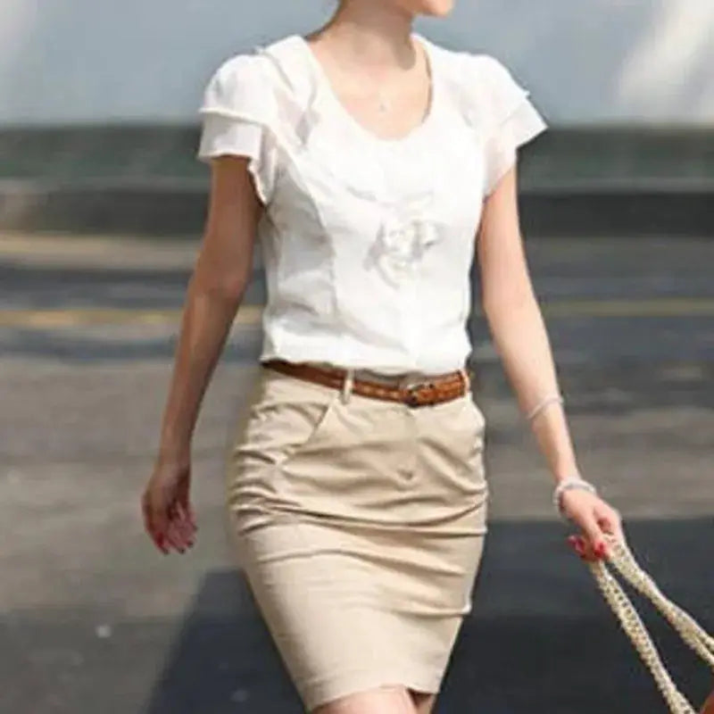 White women's blouse with short puff sleeves and front detail, office-ready top
