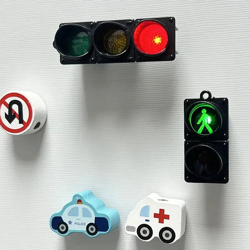 6-piece traffic light magnetic fridge magnet set; includes green pedestrian signal, blue police car, white ambulance.