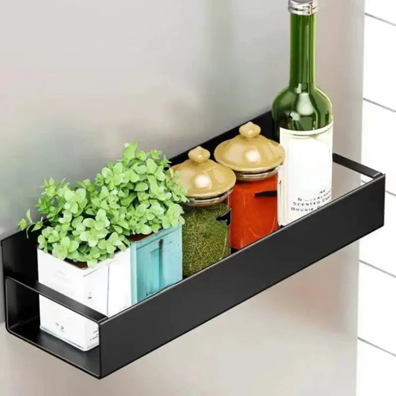 Simples Market 2pc magnetic side storage shelf, black metal, mounted on fridge, holding bottles, jars and greenery